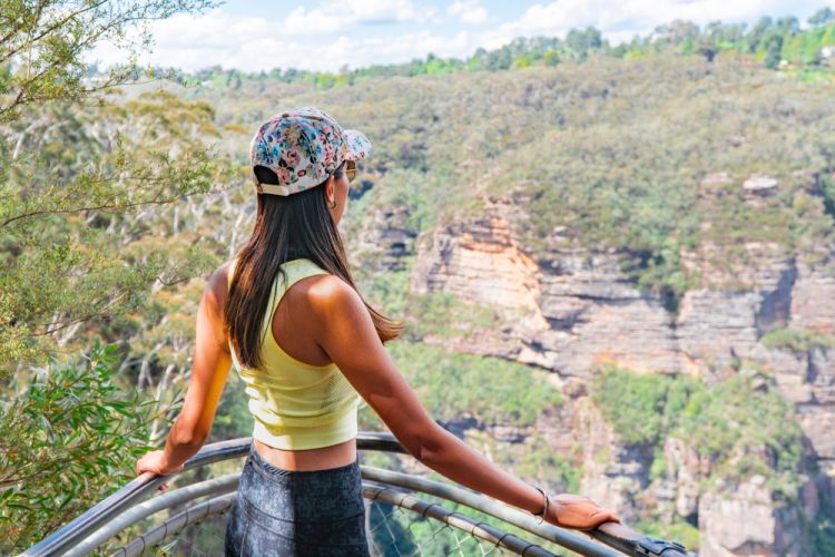 A girl in blue mountains in a comfortable clothing