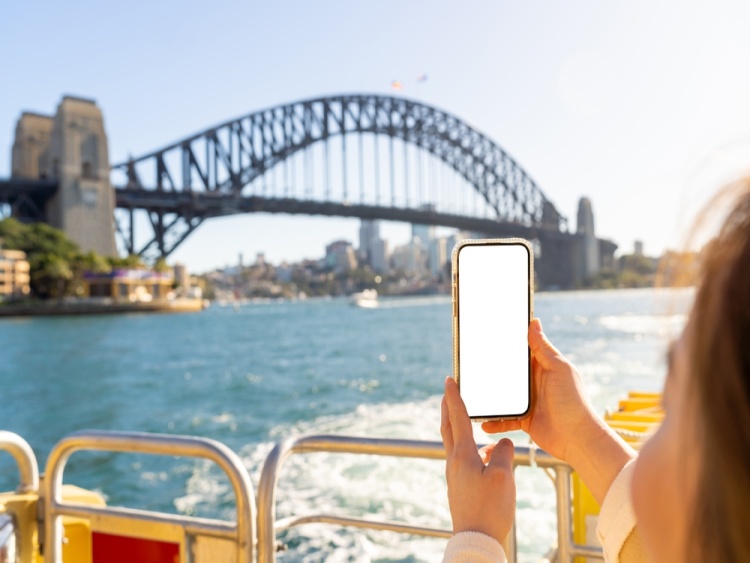 Woman capturing image blue mountains